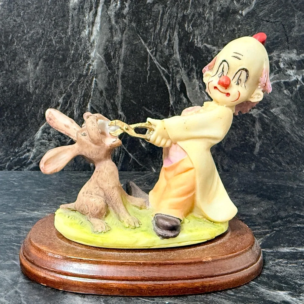 Dentist Clown Pulling Rabbits Tooth Figurine